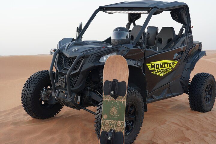 Experience the Dubai desert like never before with the Can-Am Maverick Sport 1000CC. Drive through endless dunes and enjoy a complementary sandboarding session in a stunning landscape.